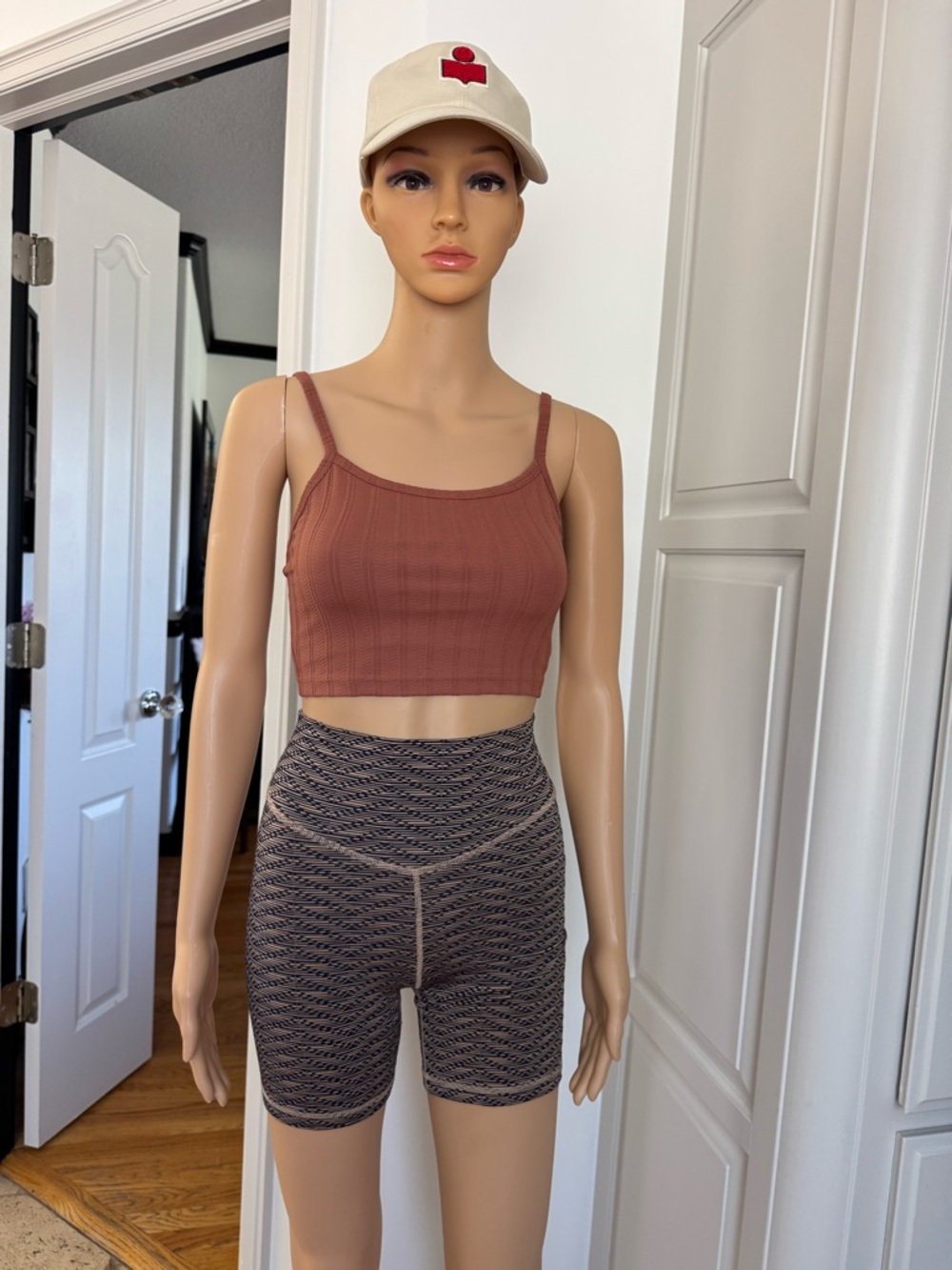 The Upside Rust Brown Ribbed Crop Tank and Patterned Gray Athletic Bike Shorts